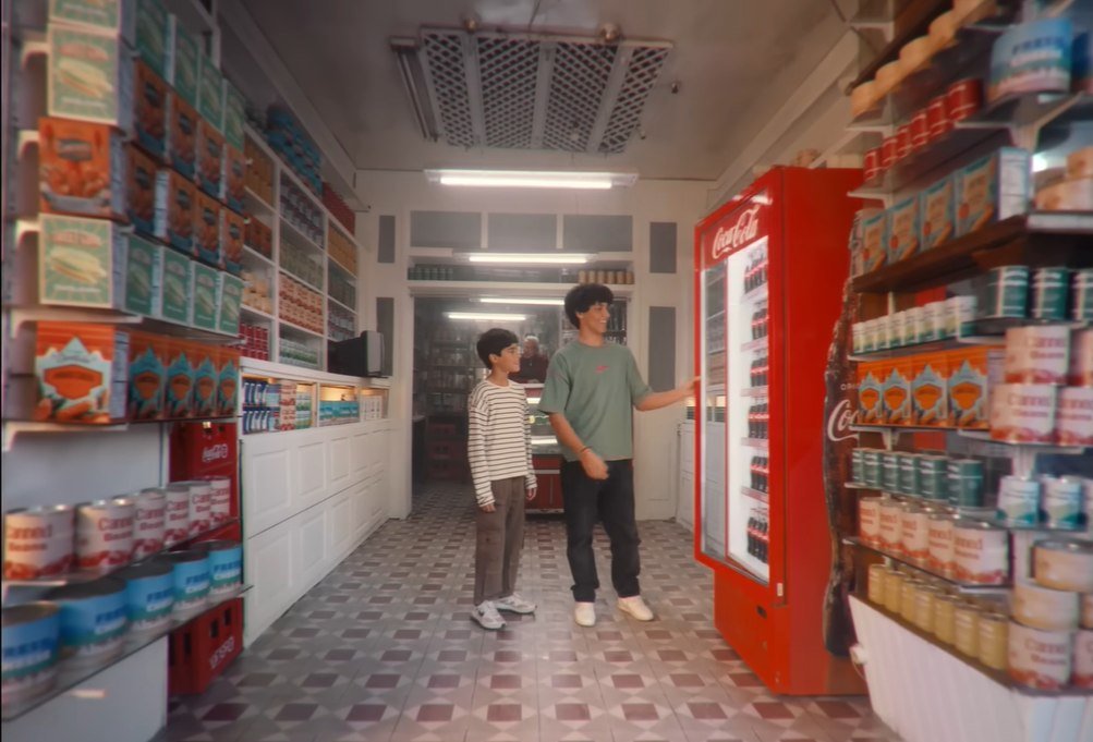 Final film frame — inside the corner shop