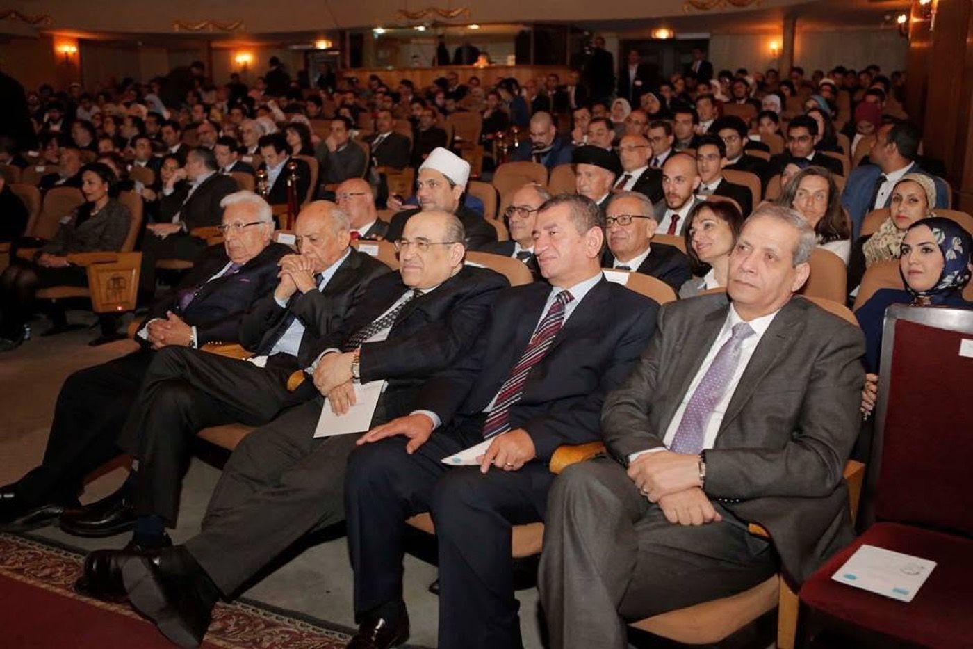 Scholars and dignitaries watching the memorial programme